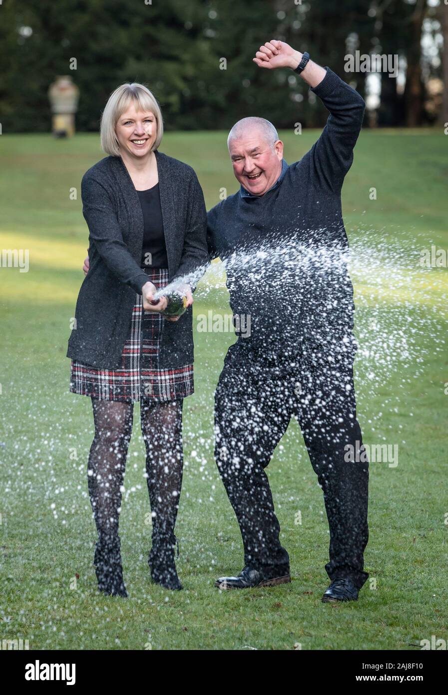 John and Allison McDonald, from Stockton On Tees, celebrating their £2 million Lotto jackpot win at Crathorne Hall, North Yorkshire. PA Photo. Picture date: Friday January 3, 2020. Three days after their win the couple found out that their 15-year-old son Ewan was clear of cancer after being diagnosed with Non-Hodgkins Lymphoma in May last year and undergoing chemotherapy treatment. See PA story LOTTERY Cancer. Photo credit should read: Danny Lawson/PA Wire Stock Photo