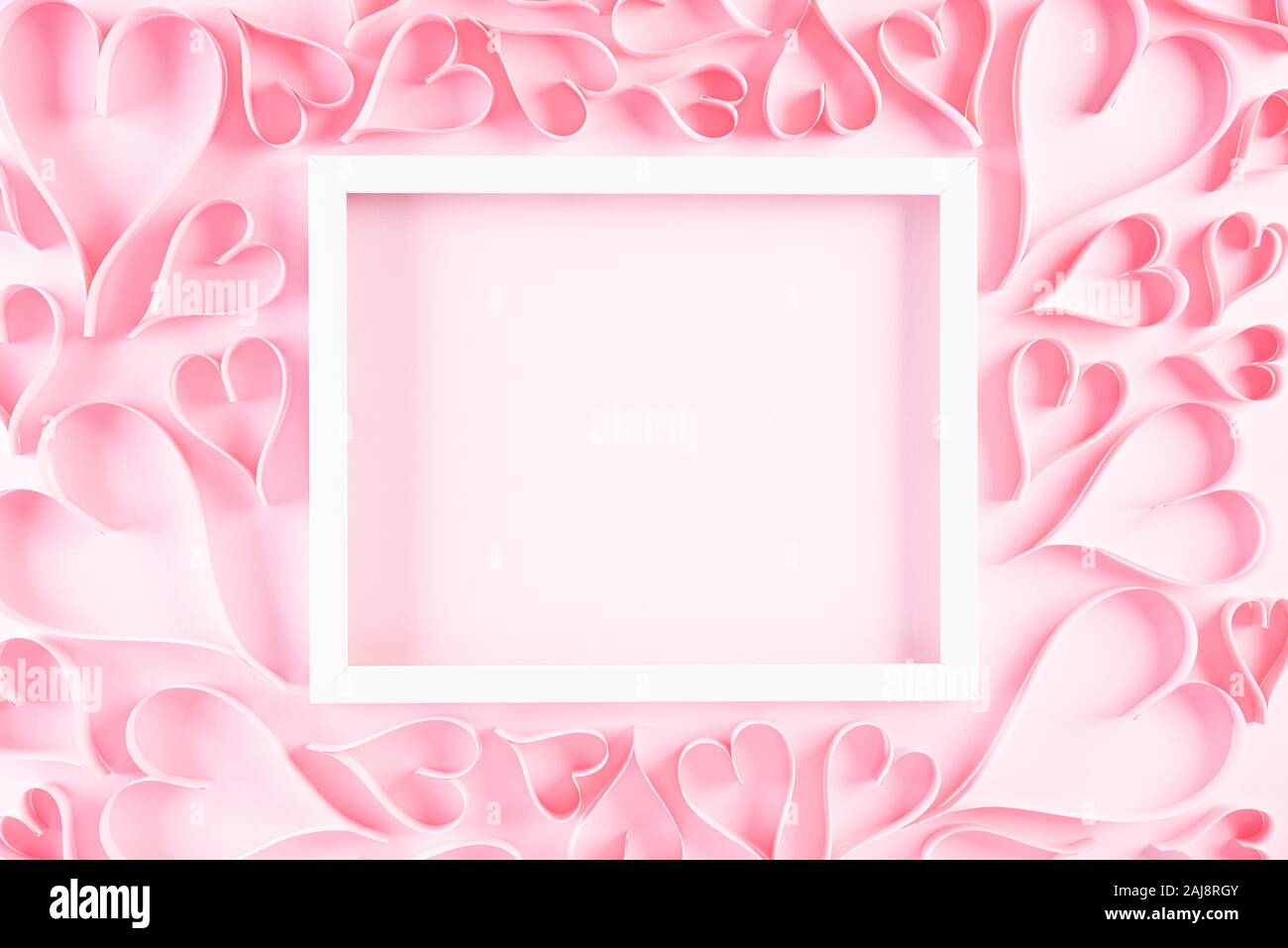 Pink Paper Hearts With White Picture Frame On Light Pink Pastel