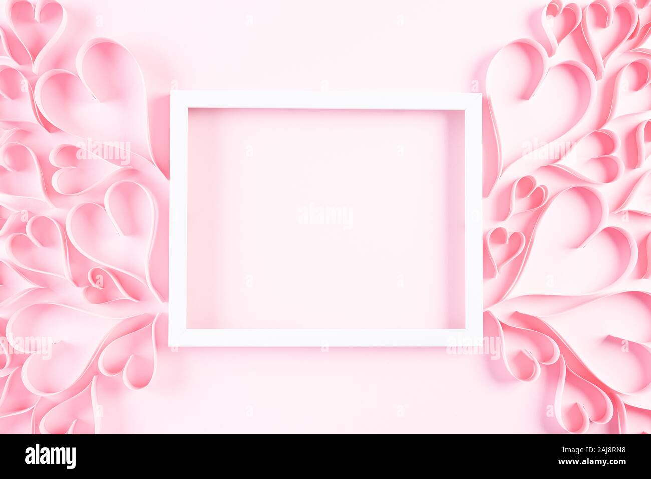 Pink Paper Hearts With White Picture Frame On Light Pink Pastel
