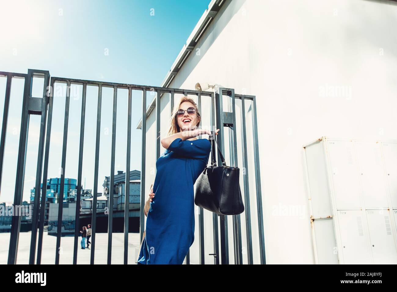 Stylish lady in blue dress Stock Photo