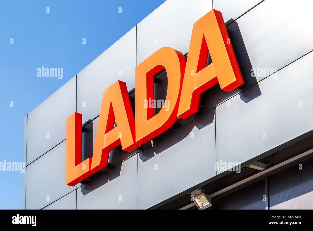 Samara, Russia - April 20, 2019: Lada dealership sign on the office of official dealer. Lada is a Russian automobile manufacturer Stock Photo