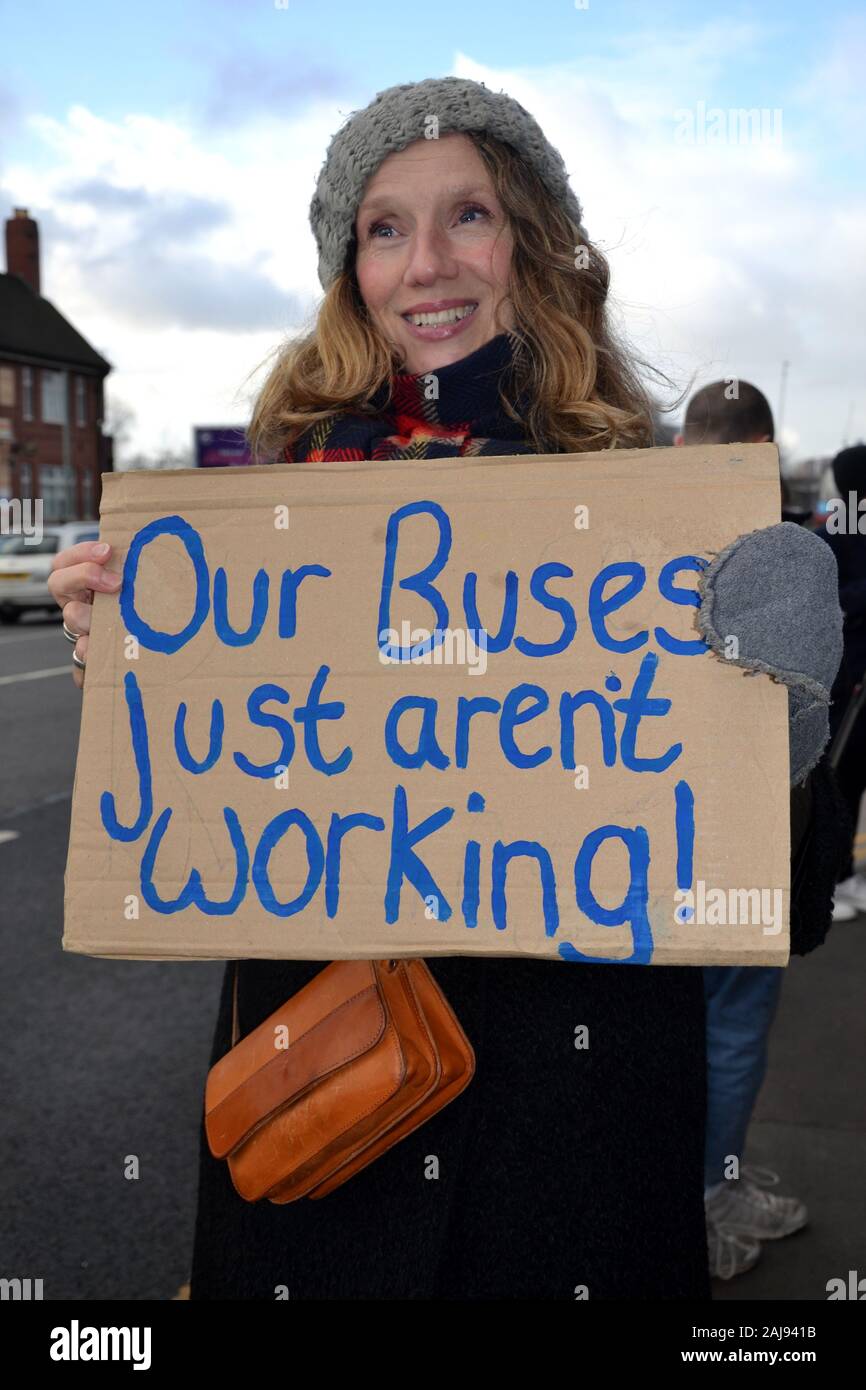 One of a group of some 25 protesters demanding better bus services which marched through Manchester, United Kingdom, on January 3, 2020. The group marched from the Stagecoach bus depot in Ardwick to the office of the Mayor of Greater Manchester, Andy Burnham, on Oxford Road, to hand in a petition of 11,510 signatures. The protesters called for bus services to be brought back into public control. The group included Andrew Gwynne, Labour MP for Denton and Reddish in Greater Manchester and Shadow Secretary of State for Communities and Local Government. Stock Photo