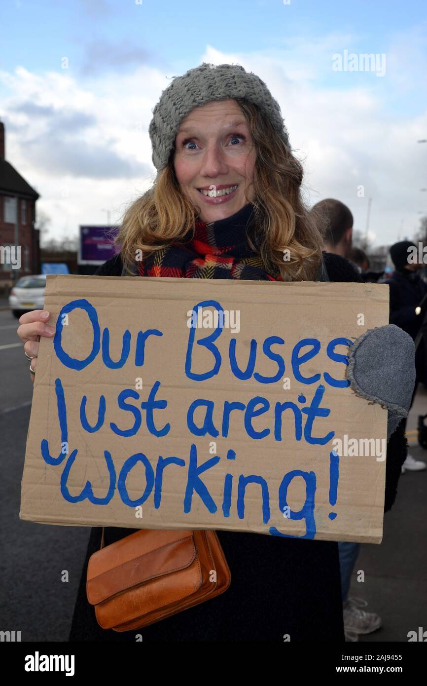One of a group of some 25 protesters demanding better bus services which marched through Manchester, United Kingdom, on January 3, 2020. The group marched from the Stagecoach bus depot in Ardwick to the office of the Mayor of Greater Manchester, Andy Burnham, on Oxford Road, to hand in a petition of 11,510 signatures. The protesters called for bus services to be brought back into public control. The group included Andrew Gwynne, Labour MP for Denton and Reddish in Greater Manchester and Shadow Secretary of State for Communities and Local Government. Stock Photo