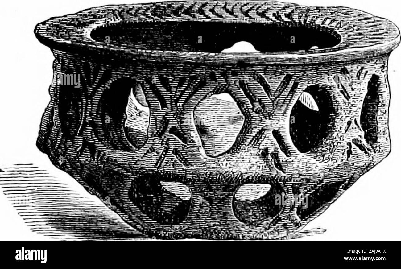 A guide to the antiquities of the bronze age in the Department of British and mediæval antiquities . Fm. 21. Incense-cup, North Newbold,E. R. Yoiks. f INCENSE-CUPS 51 in the centre of the mound was a ring of seven holes in theoriginal surface, about 1 ft. deep and 2 in. in diameter, partly-filled with charred or decayed wood (of. Case 27). At Bulford,Wilts., a remarkable specimen (fig. 22) was found in a barrow. Stock Photo