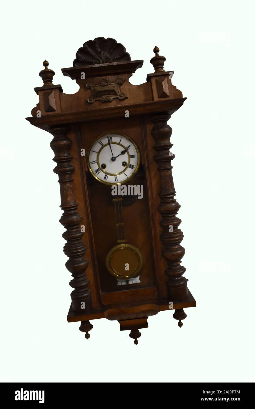 Wooden wall clock isolated on white background Stock Photo - Alamy