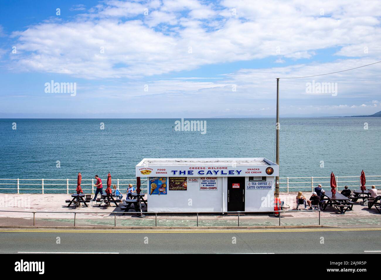The Cayley, fish and chips shop on the promenade in Rhos-on-Sea Wales UK Stock Photo