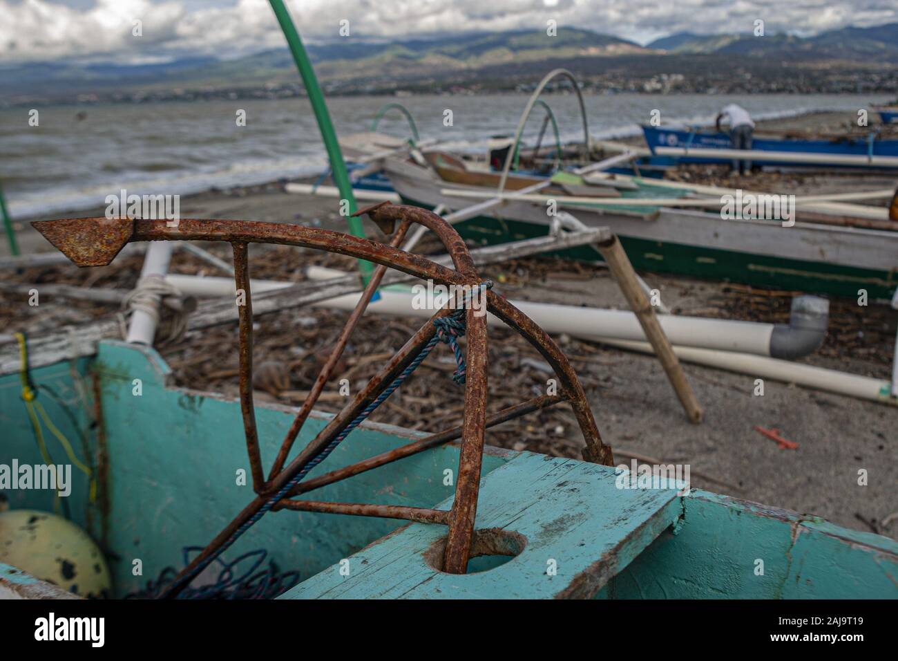 Palu City, Central Sulawesi, Indonesia. 3rd Jan, 2020. An anchor on a fishing boat.High waves in the waters of Palu Bay forced Hundreds of fishermen in the village of Lere to anchor their boats. According to the Palu Meteorology, Climatology and Geophysics Agency (BMKG) the waves reached two meters to three meters, considered quite dangerous for fishermen. Credit: Opan Bustan/SOPA Images/ZUMA Wire/Alamy Live News Stock Photo