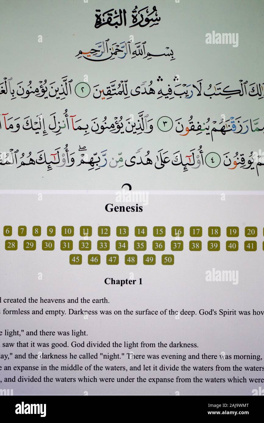 Digital kuran and bible on a tablet Stock Photo
