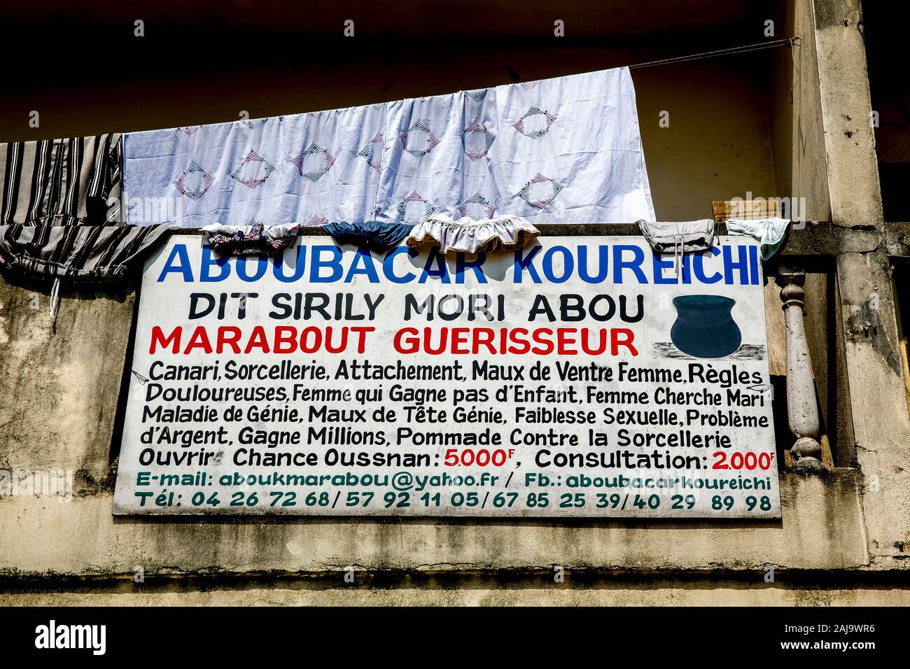 Healer's sign in abidjan, ivory coast Stock Photo