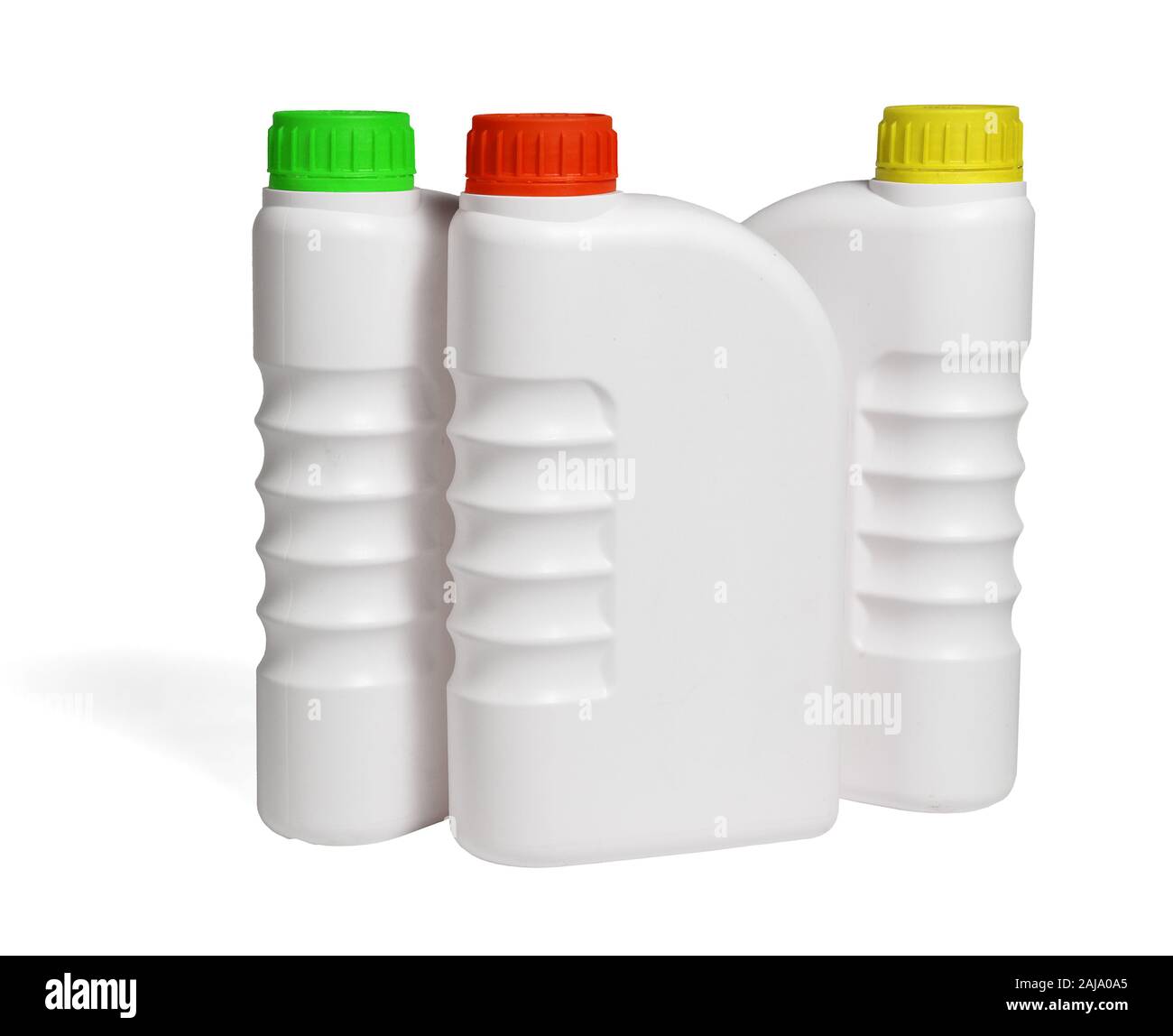 Plastic Containers for Engine Lubricants on White Background Stock Photo