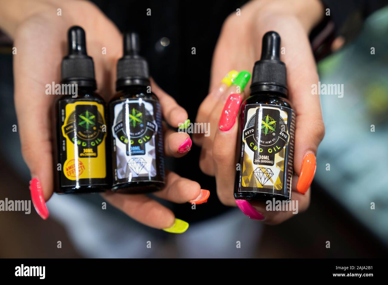 CBD oil products for sale on UK high street. Stock Photo