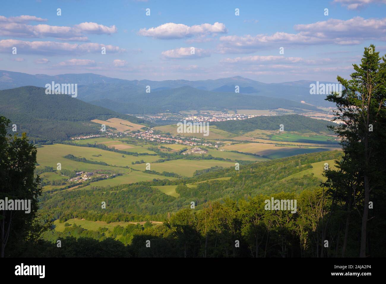 Slovakia - The view from Plesivecka planina plateau in national park Slovensky Kras to Roznava and Volovske vrchy mountains. Stock Photo