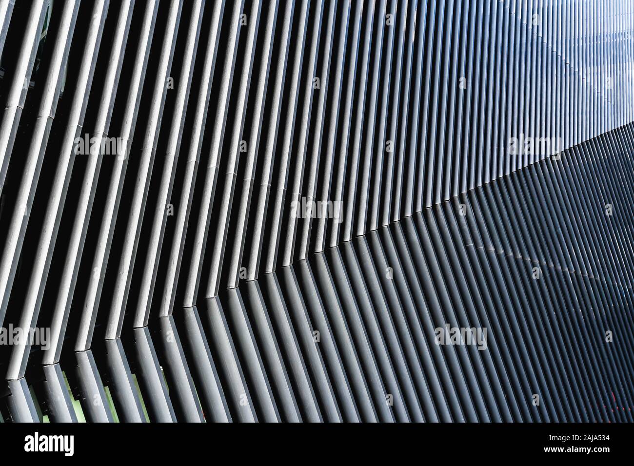 Angled parallel lines on the facade of a modern architecture building Stock Photo