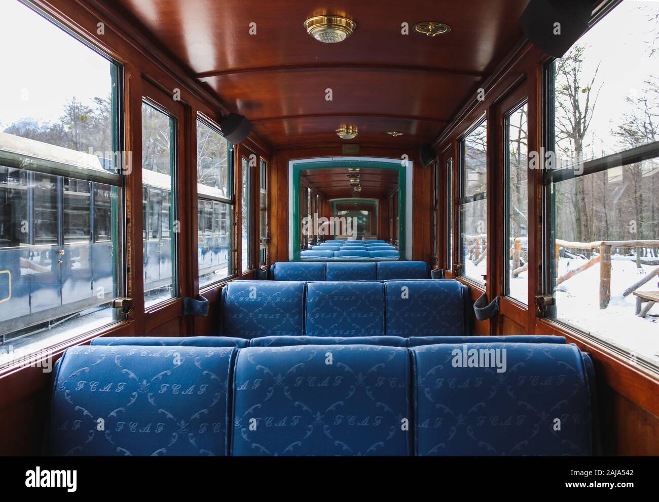 Empty inside of the end of the world train in Ushuaia, Argentina. Stock Photo