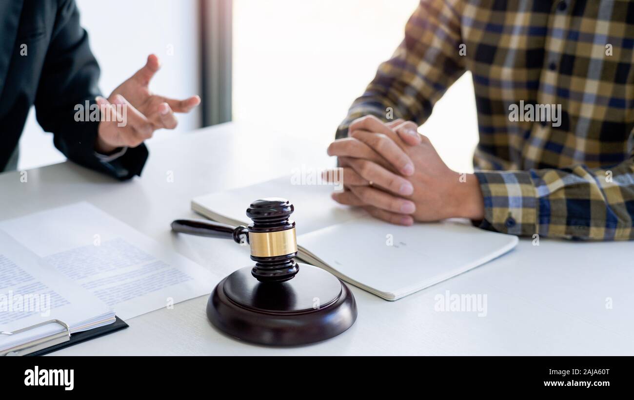 business people and lawyers discussing contract papers sitting at the table. Concepts of law  advice  legal services Stock Photo