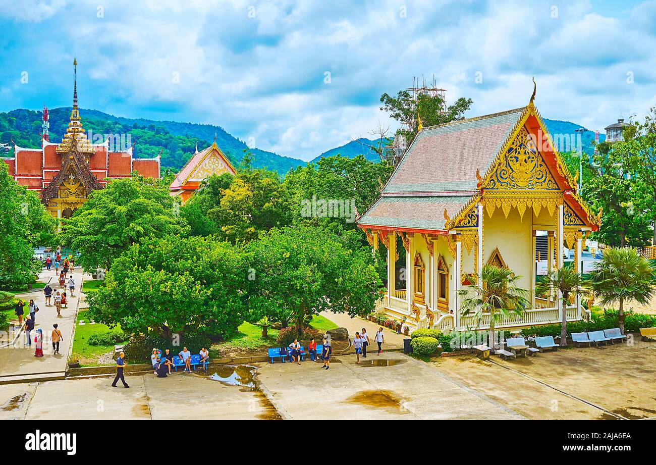 CHALONG, THAILAND - APRIL 30, 2019: Observe the grounds of Wat Chalong from the top floors of its Pagoda - the shrines and Ubosot of the complex are s Stock Photo