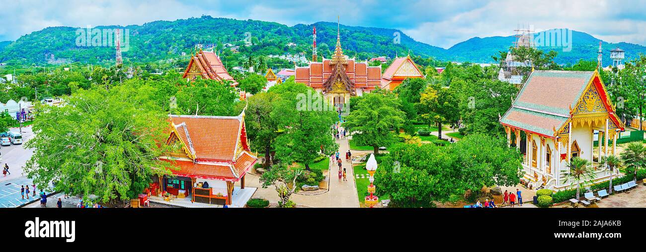 CHALONG, THAILAND - APRIL 30, 2019: The Panorama of Wat Chalong Temple with its Ubosot amid the garden and shrines from the both sides, on April 30 in Stock Photo