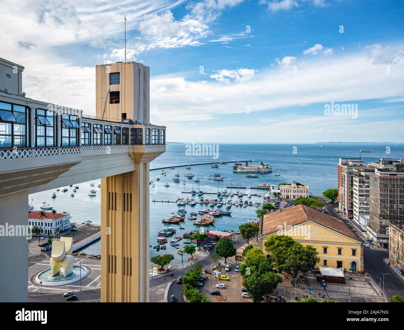 Architectural landmark Lacerda Lift and Bay of All Saints (Portuguese: Baia de Todos os Santos) on a sunny day in Salvador da Bahia, Brazil. Stock Photo