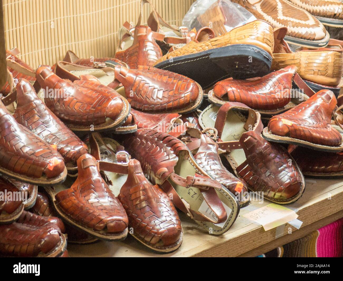 Mexican Huarache style shoes and sandals for sale in Mercado, San Antonio, Texas Stock Photo