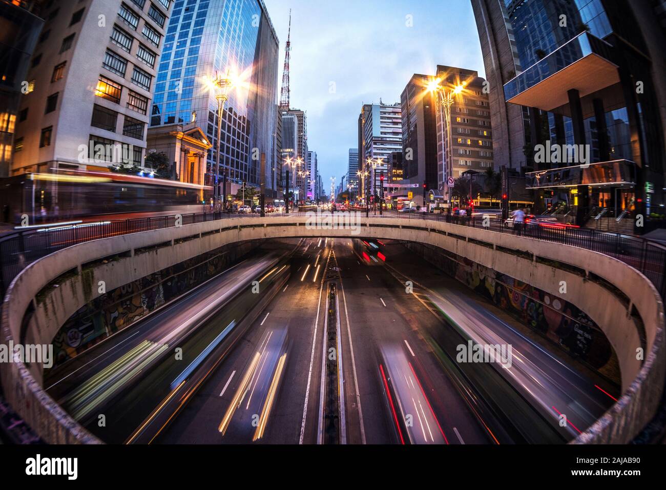 Sao Paulo cityscape and of traffic on famous Paulista Avenue at dusk in Sao Paulo, Brazil, South America. Stock Photo