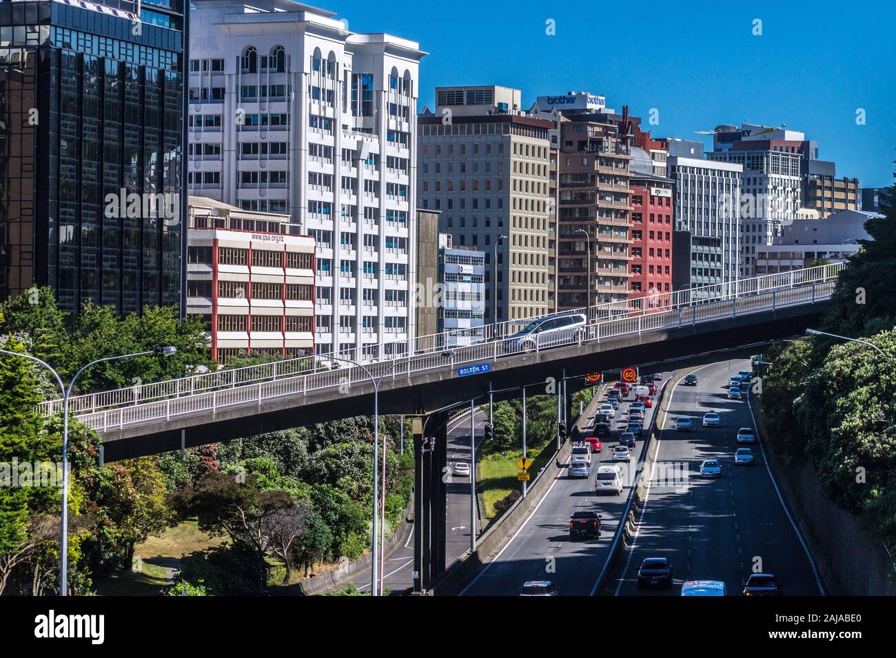 Motorway, modern tower blocks and Bolton Street viaduct crossing Wellington urban motorway, Wellington, New Zealand Stock Photo