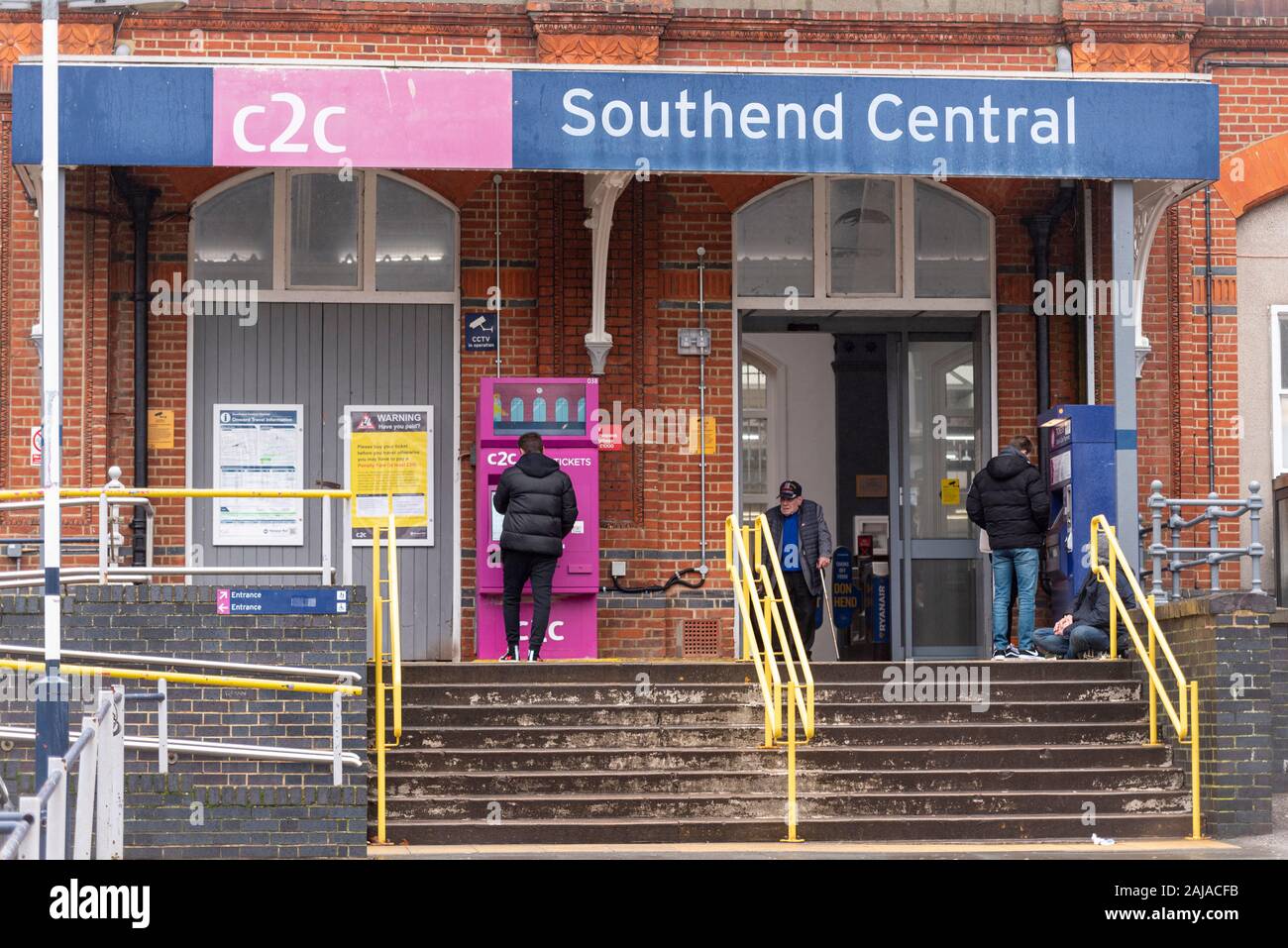 New ticket machine outside Trenitalia C2C Southend Central railway station in Southend on Sea, Essex, UK. Passenger using machine. Problematic system Stock Photo