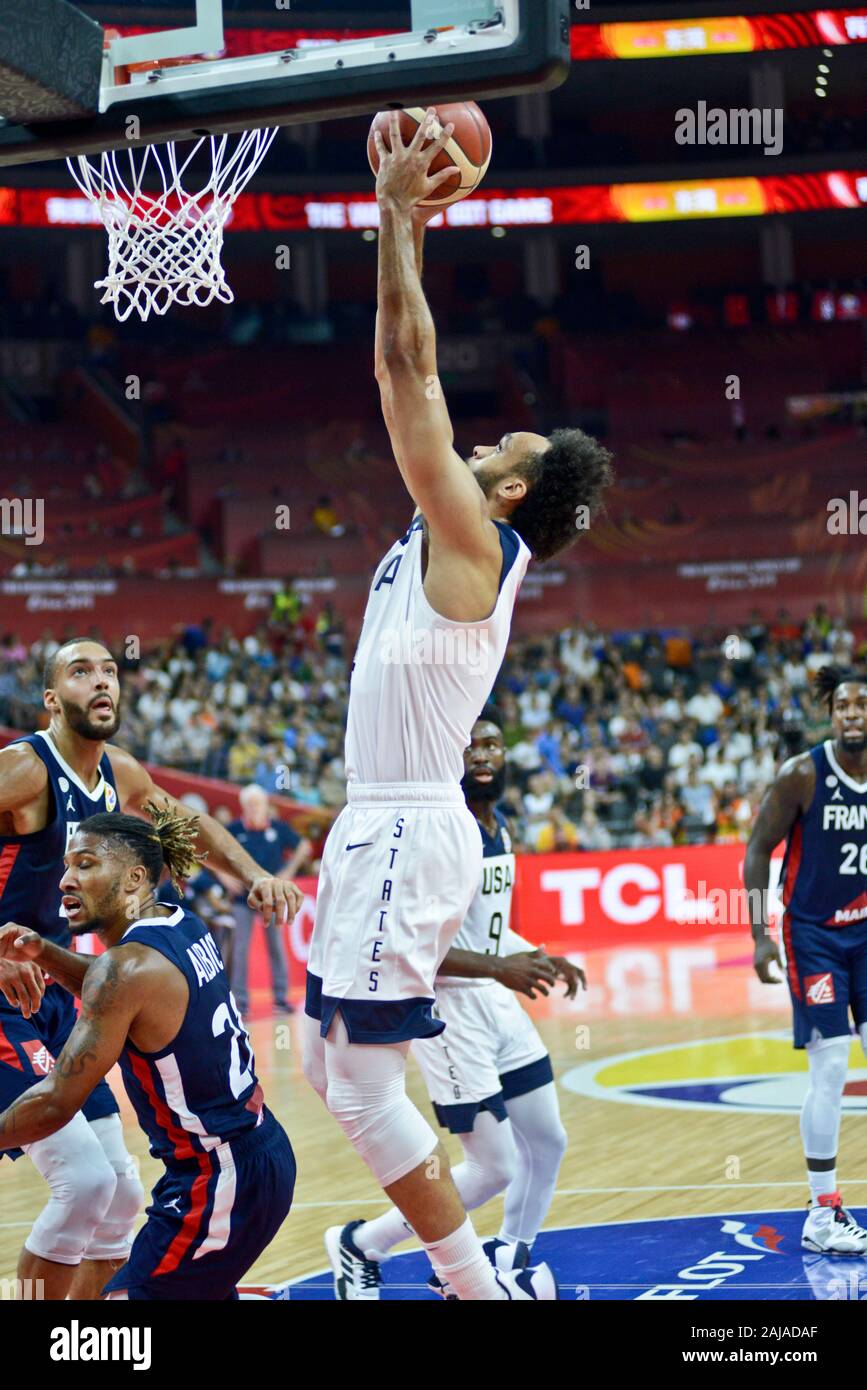 Derrick White (United States) dunking over Rudy Gobert (France). FIBA Basketball World Cup China 2019, Quarter Finals Stock Photo