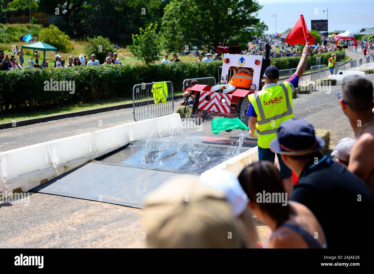 Car jumps over water ramp in Portishead Soapbox Race 2019 Stock Photo