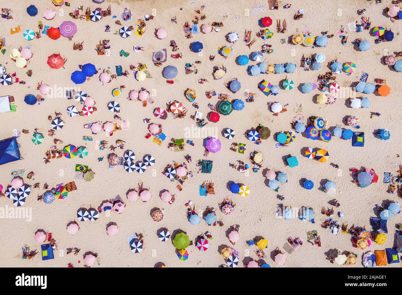 Rio de Janeiro, Brazil, top view of Copacabana Beach showing colourful umbrellas and people relaxing on a summer day. Stock Photo