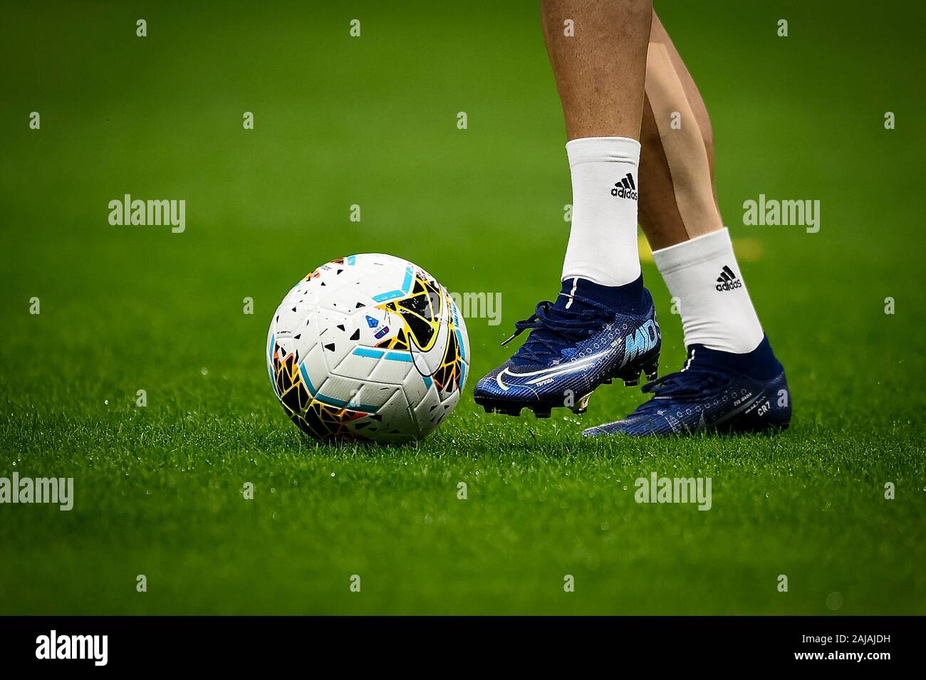 Milan, Italy. 6 October, 2019: A detail of Nike Mercurial Superfly 7 Elite  boots wearing by Cristiano Ronaldo and the official Serie A matchball Nike  Merlin are seen during warm up prior