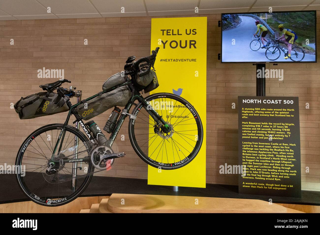 Bike ridden by Mark Beaumont during his record breaking cycle of the North Coast 500 and the Africa Solo challenge on display at Edinburgh Airport ... Stock Photo