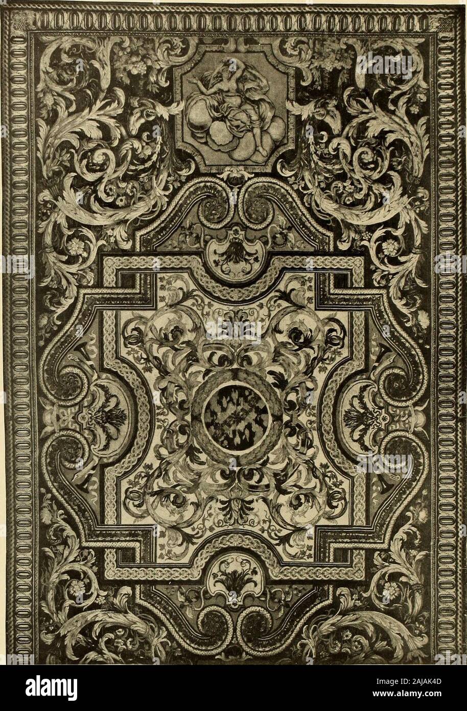 Decorative textiles; an illustrated book on coverings for furniture, walls and floors, including damasks, brocades and velvets, tapestries, laces, embroideries, chintzes, cretonnes, drapery and furniture trimmings, wall papers, carpets and rugs, tooled and illuminated leathers . ? Plate I—SAMPLE OF MODERN FRENCH SAVONNERIETo show colour, design and texture 141. Plate II—SAVONNERIE RUG OF THE SEVENTEENTH CENTURY 142 CARPETS AND RUGS and pryde. A rare departure from custom is the bedroom men-tioned in the Story of Thebes, the floor of which was covered withcloth of gold. Only in the fifteenth ce Stock Photo