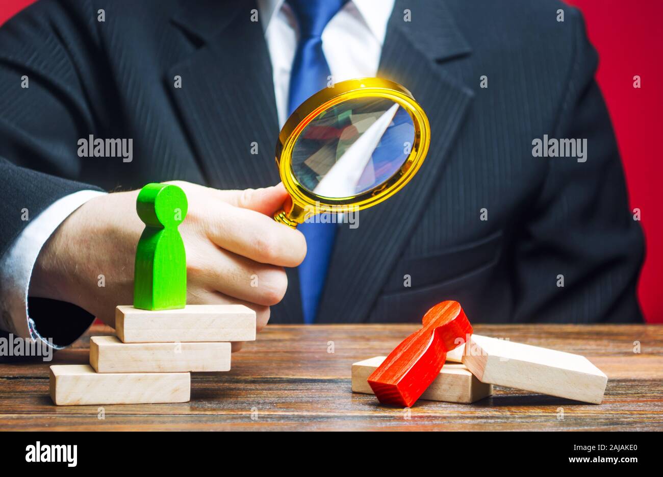 Man examines a defeated person. Analysis and work on mistakes. Weakness incompetence. Unprepared, unprofessional. Diplomacy, business. Struggle in com Stock Photo