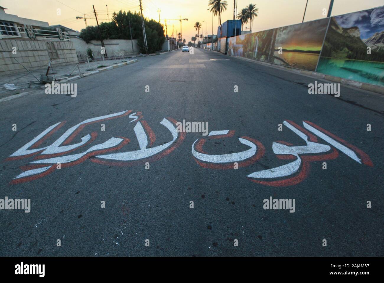 03 January 2020, Iraq, Baghdad "Death to America" is seen written in