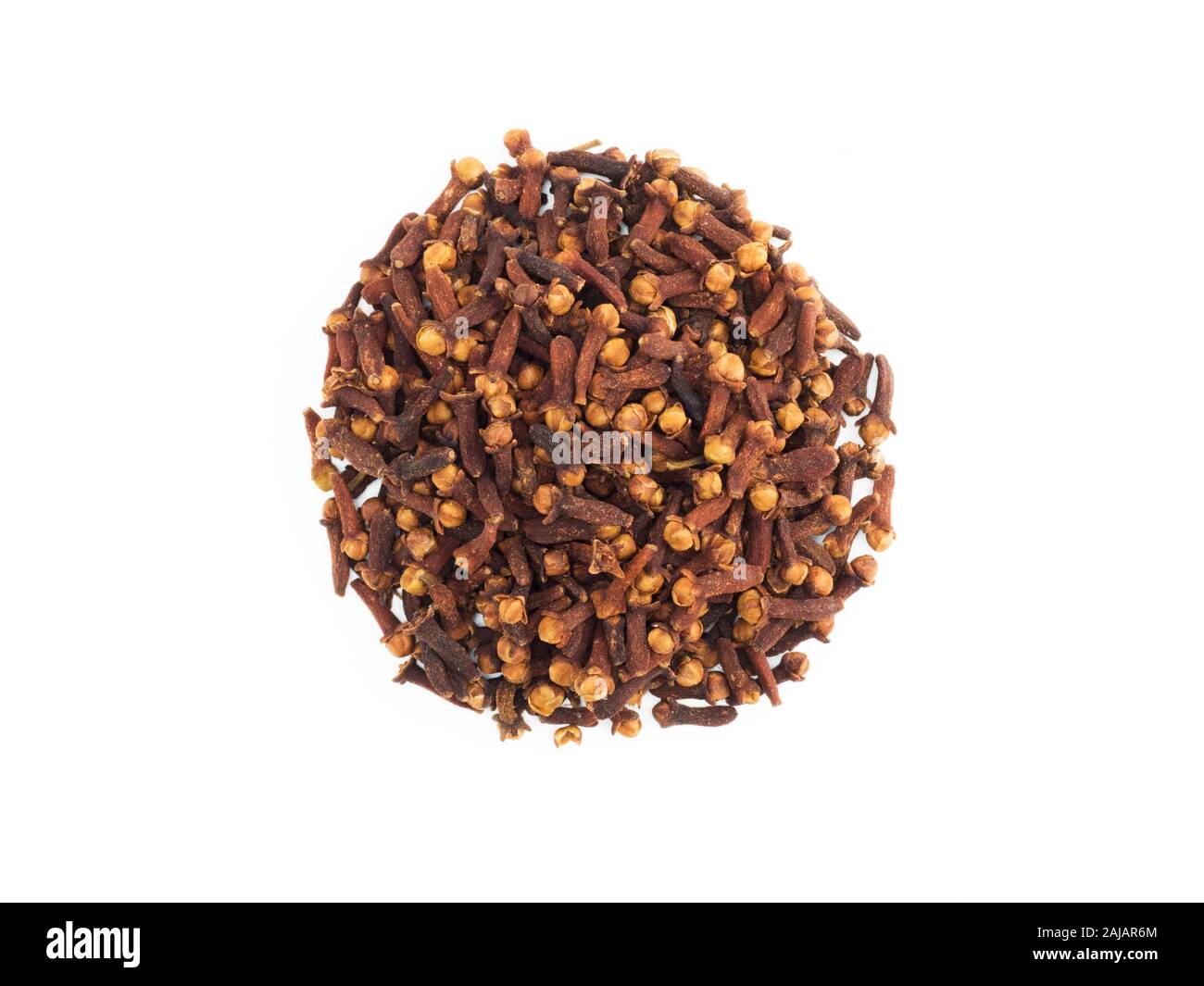 A round bunch of cloves on white isolated background. Indian cuisine