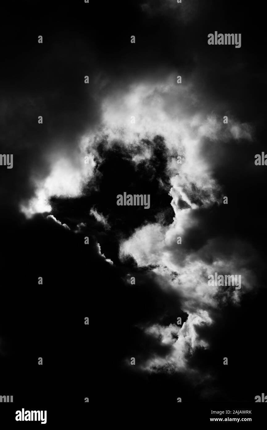 Cumulus congestus clouds rain likely in black and white Stock Photo - Alamy