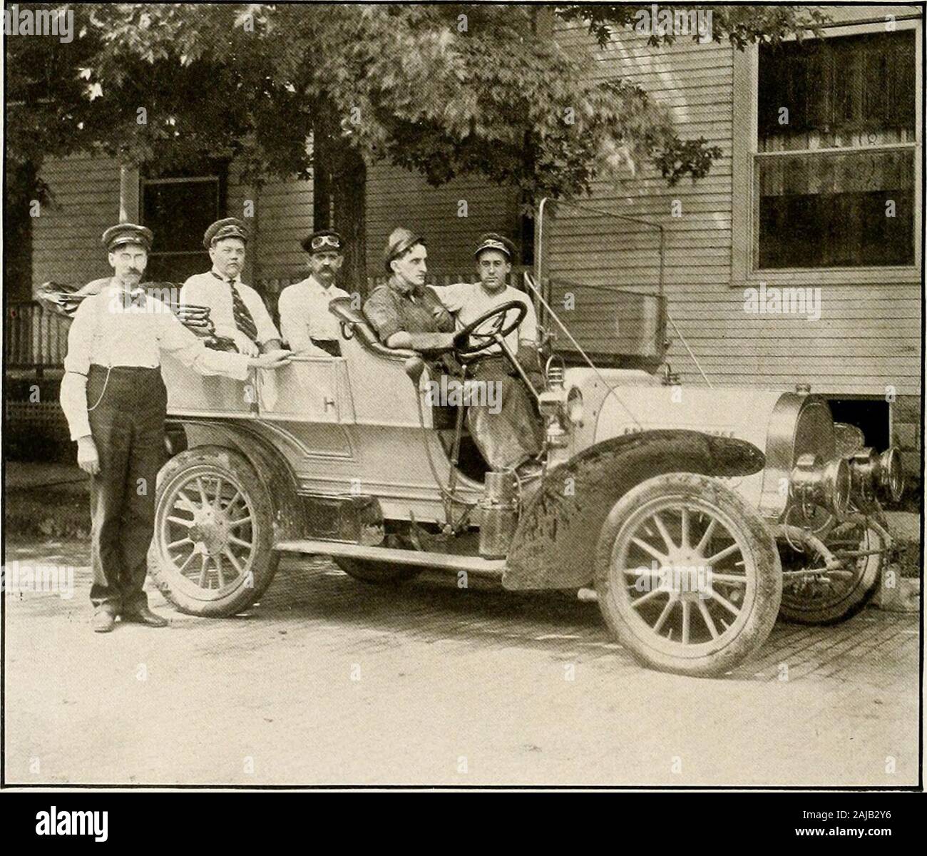 Waynesburg, prosperous and beautiful : a souvenir pictorial story of the biggest and best little city in Pennsylvania . E. B. Throckmorton and Party Starting on a Mountain Trip. Starting on a Three-hundred-mile Spin over the Alleghenies Stock Photo