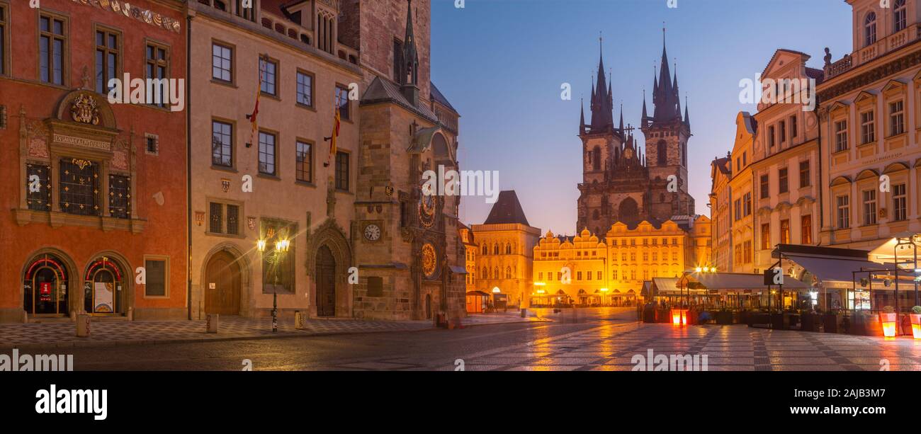 PRAGUE, CZECH REPUBLIC - OCTOBER 16, 2018: The Orloj on the Old Town hall, Staromestske square and Our Lady before Týn church at dusk. Stock Photo