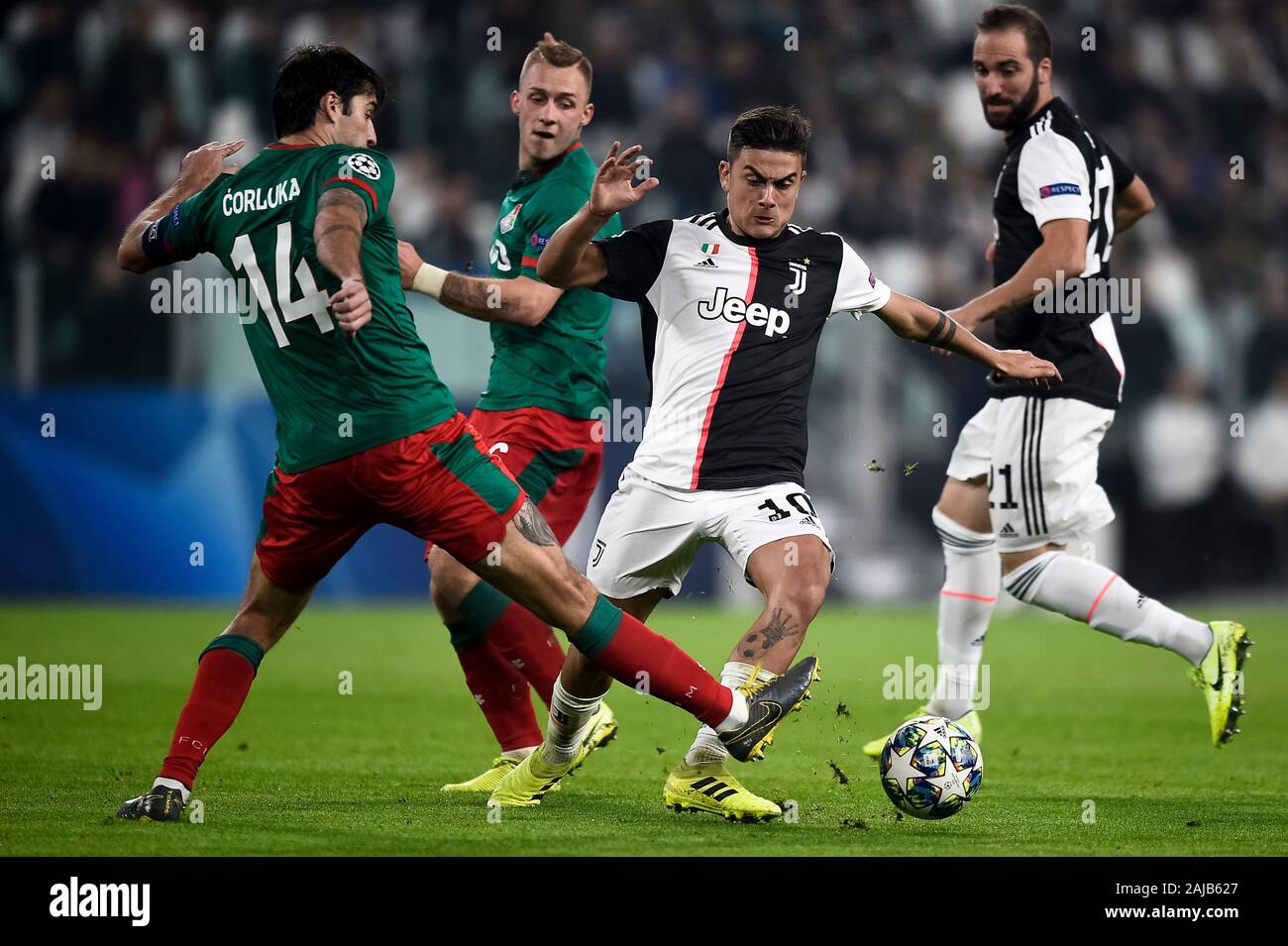 Turin, Italy - 22 October, 2019: Paulo Dybala (C) of Juventus FC competes for the ball with Vedran Corluka (L) of Lokomotiv Moscow during the UEFA Champions League football match between Juventus FC and FC Lokomotiv Moscow. Juventus FC won 2-1 over FC Lokomotiv Moscow. Credit: Nicolò Campo/Alamy Live News Stock Photo
