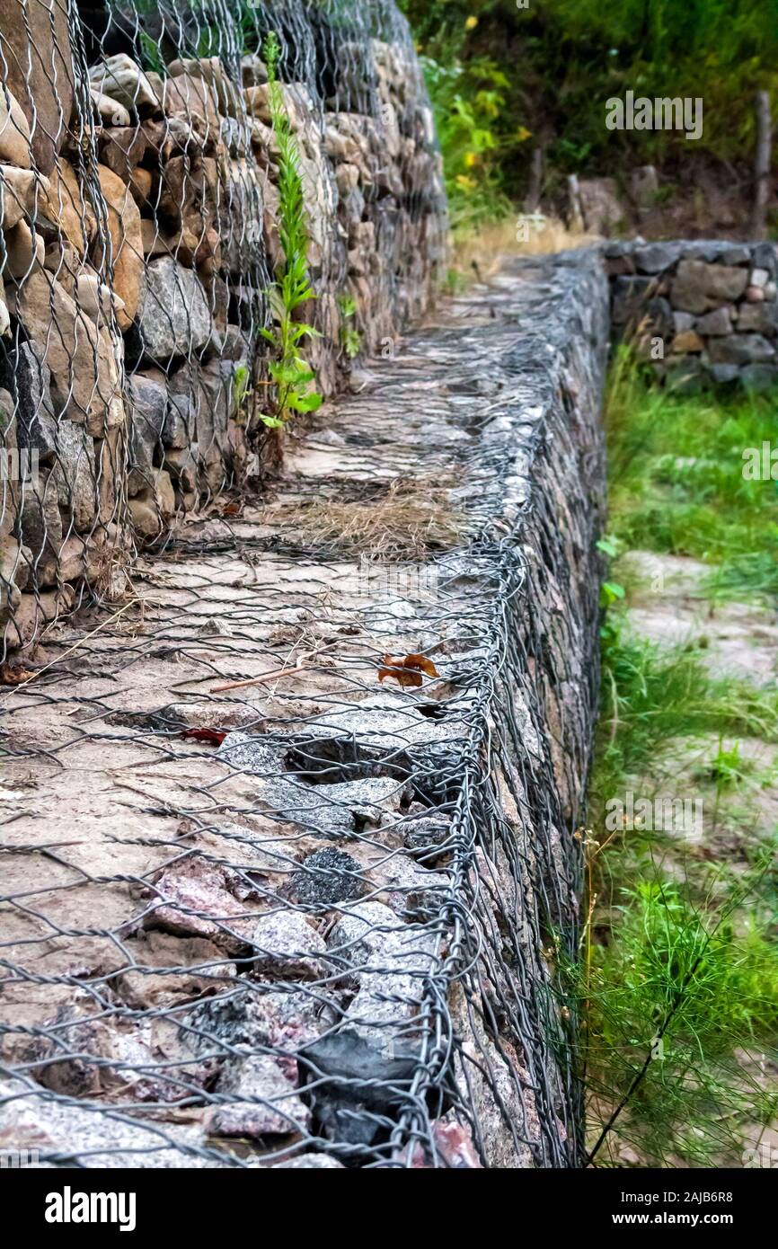 Gabion wall stones in wire mesh used for erosion control and slope