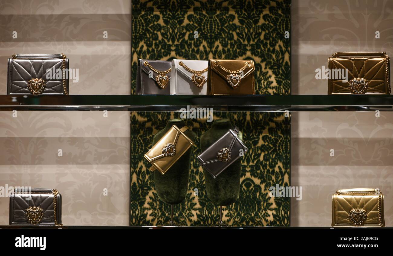Milan, Italy - February 22, 2019:  Dolce Gabbana luxury purses in a store in Milan. Stock Photo