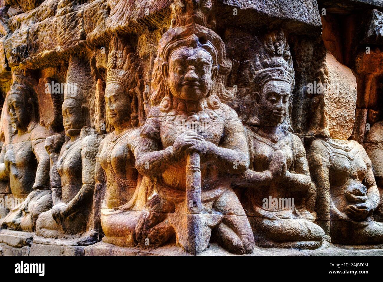 Terrace of the Leper King at Angkor, Siem Reap, Cambodia. Close up detail of ancient bas relief carvings on the wall. Stock Photo