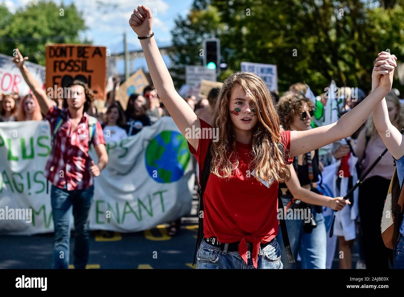 Lausanne, Switzerland - 09 August, 2019: A climate activist attend a Fridays For Future strike for climate protection that is part of 'SMILE for Future' event. More than 450 young climate activists from different European countries gathered to attend the summit 'SMILE for Future', that stands for Summer Meeting in Lausanne Europe. The aim of the summit is to reinforce the links between the participants of the European Youth Climate Strike movement and to define the future of the mobilisation against climate change. Credit: Nicolò Campo/Alamy Live News Stock Photo