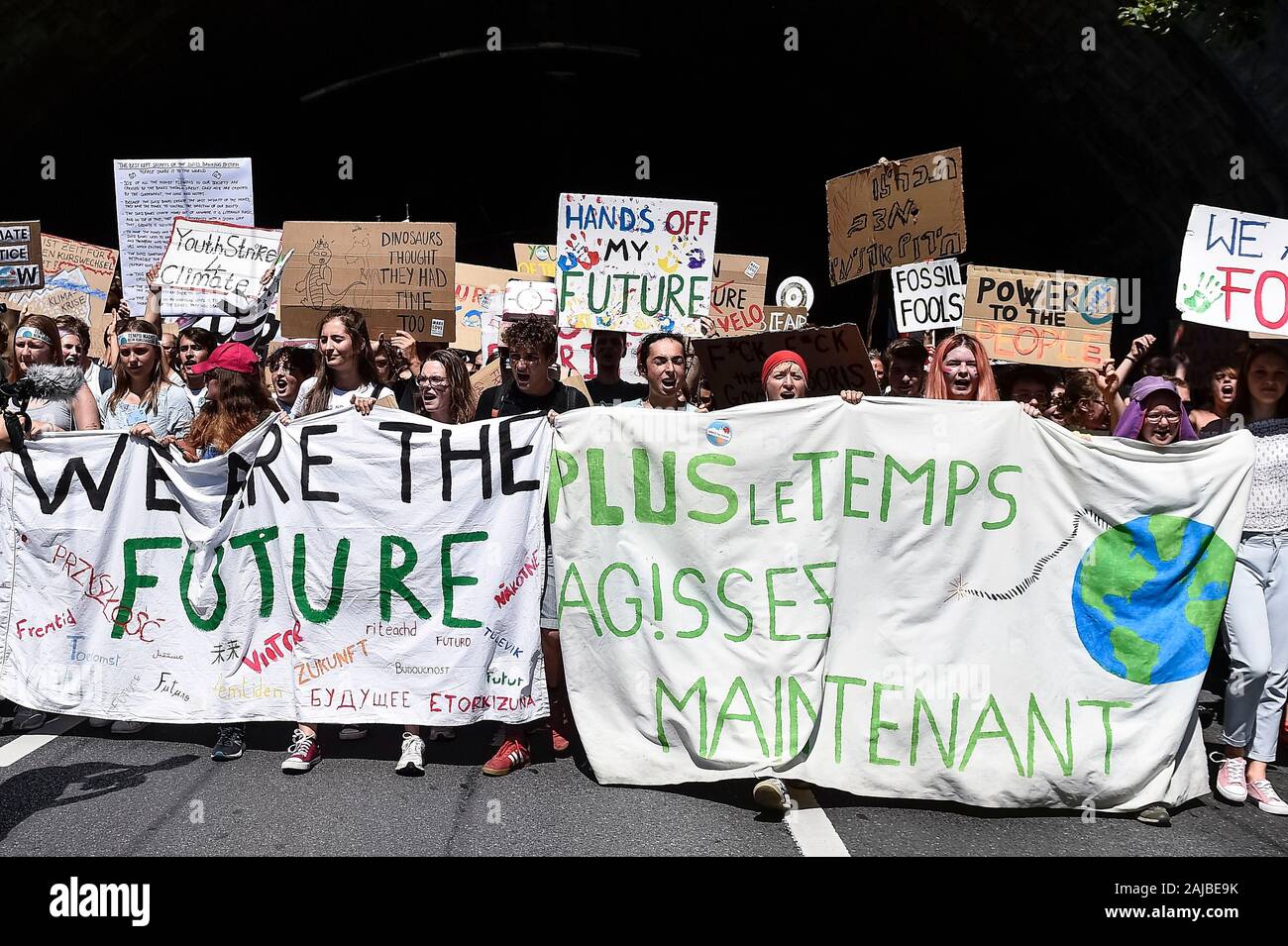 Lausanne, Switzerland - 09 August, 2019: Climate activists attend a Fridays For Future strike for climate protection that is part of 'SMILE for Future' event. More than 450 young climate activists from different European countries gathered to attend the summit 'SMILE for Future', that stands for Summer Meeting in Lausanne Europe. The aim of the summit is to reinforce the links between the participants of the European Youth Climate Strike movement and to define the future of the mobilisation against climate change. Credit: Nicolò Campo/Alamy Live News Stock Photo