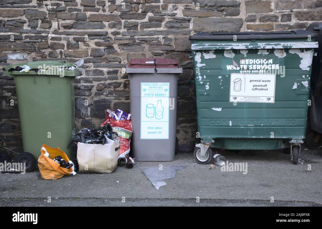 Aberystwyth Ceredigion Wales, UK January 03 2019: Overflowing glass recycling bin awaiting collection Stock Photo