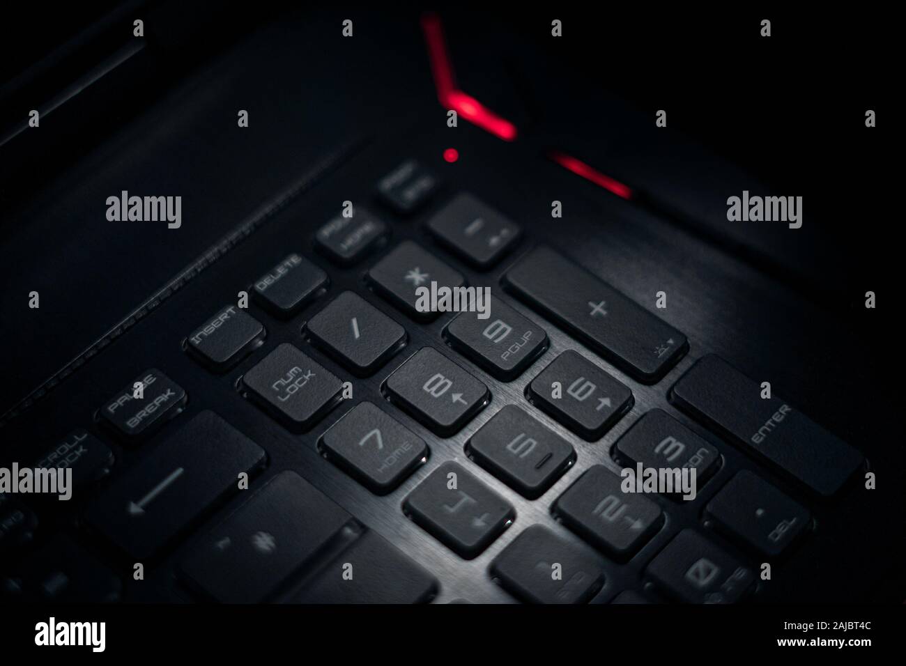 Close up of black keyboard with numpad or numeric keypad of modern