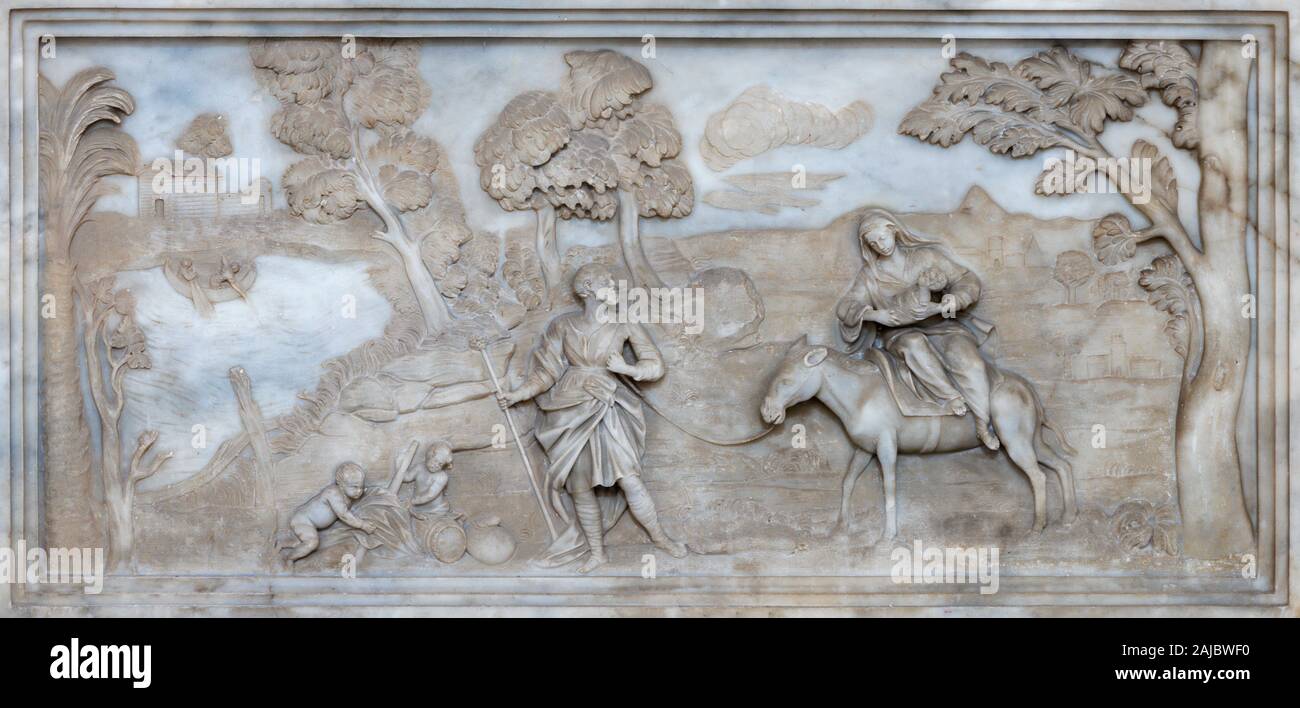 CATANIA, ITALY - APRIL 7, 2018: The baroque marble relief of Flight to Egypt in Chiesa di San Nicolo d Arena. Stock Photo