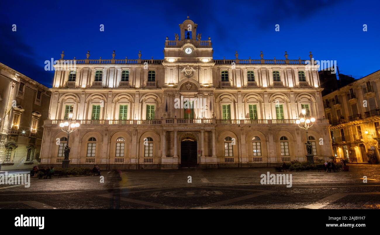 CATANIA, ITALY - APRIL 8, 2018:The facade of University at dusk. Stock Photo