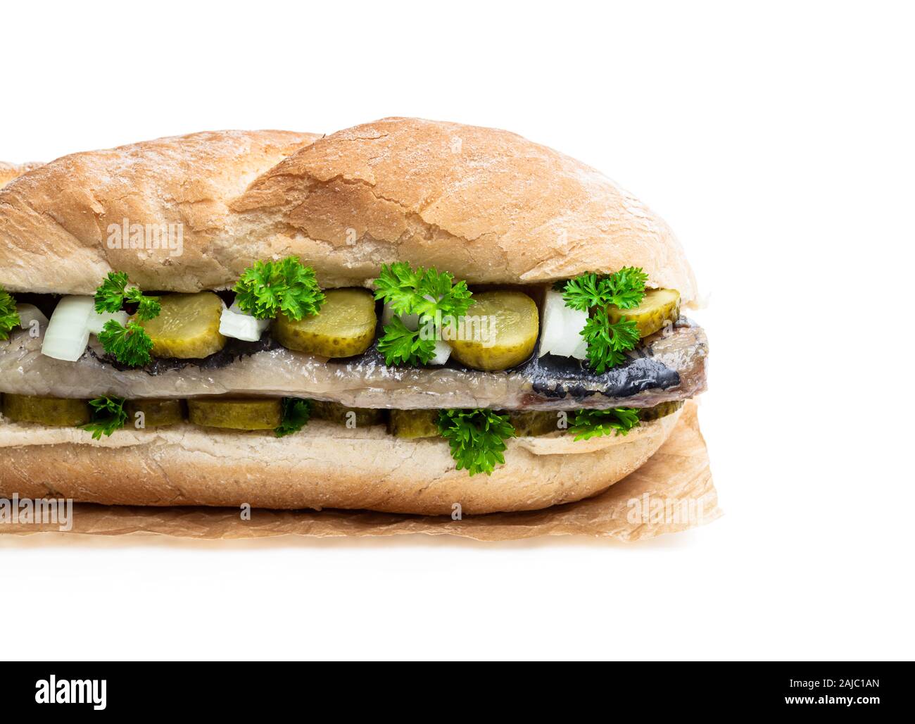 Traditional Dutch sandwich with herring and pickles isolated on white Stock Photo Alamy
