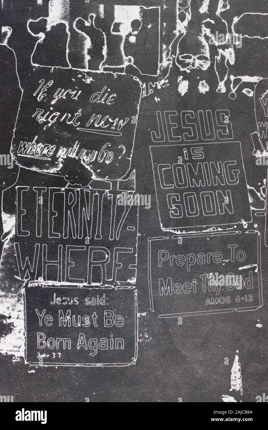 Fine 1970s black and white extreme photography of handmade placards advertising the second coming of Jesus Stock Photo